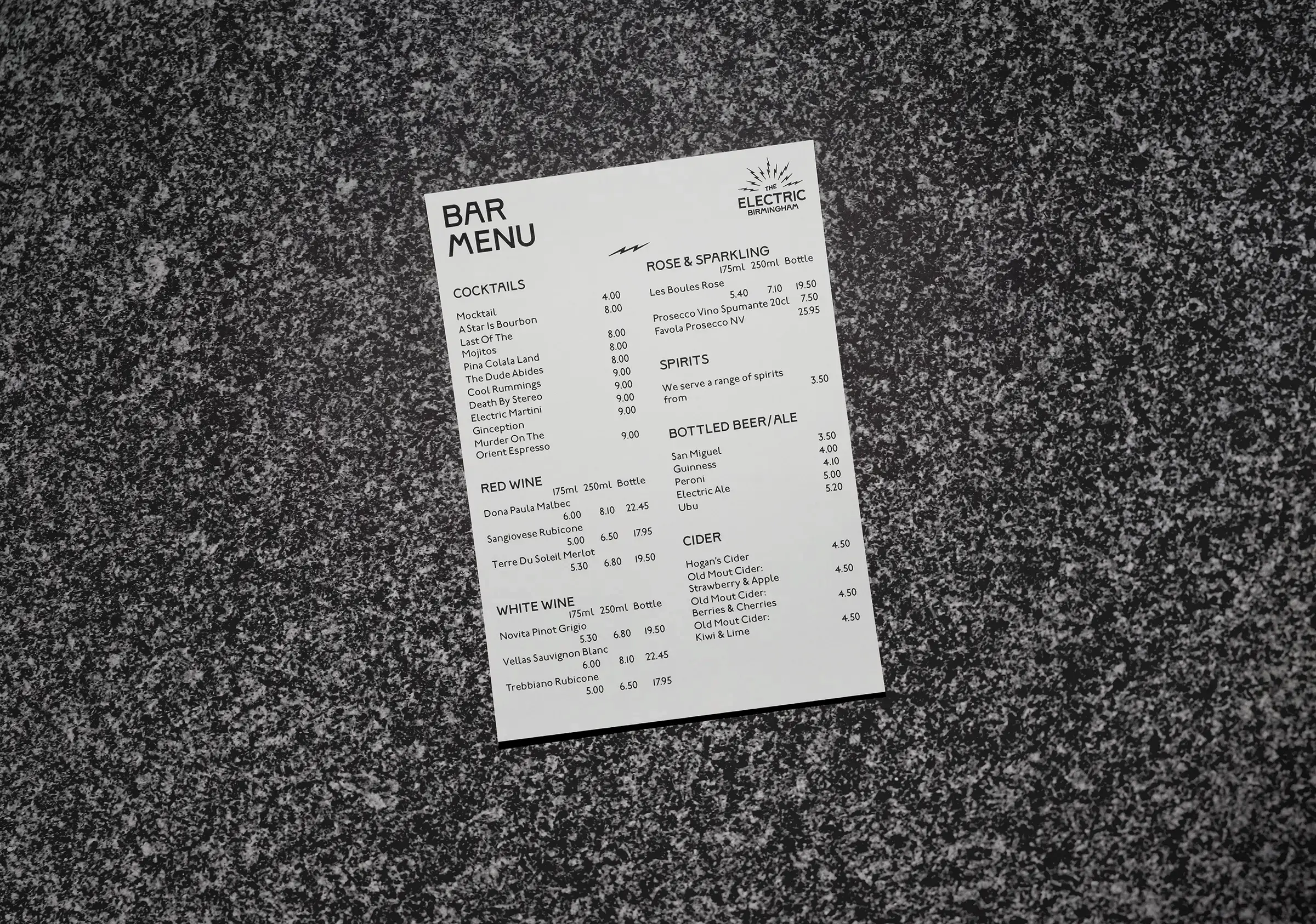 An image of the Cafe Bar menu for The Electric on a black marble background.