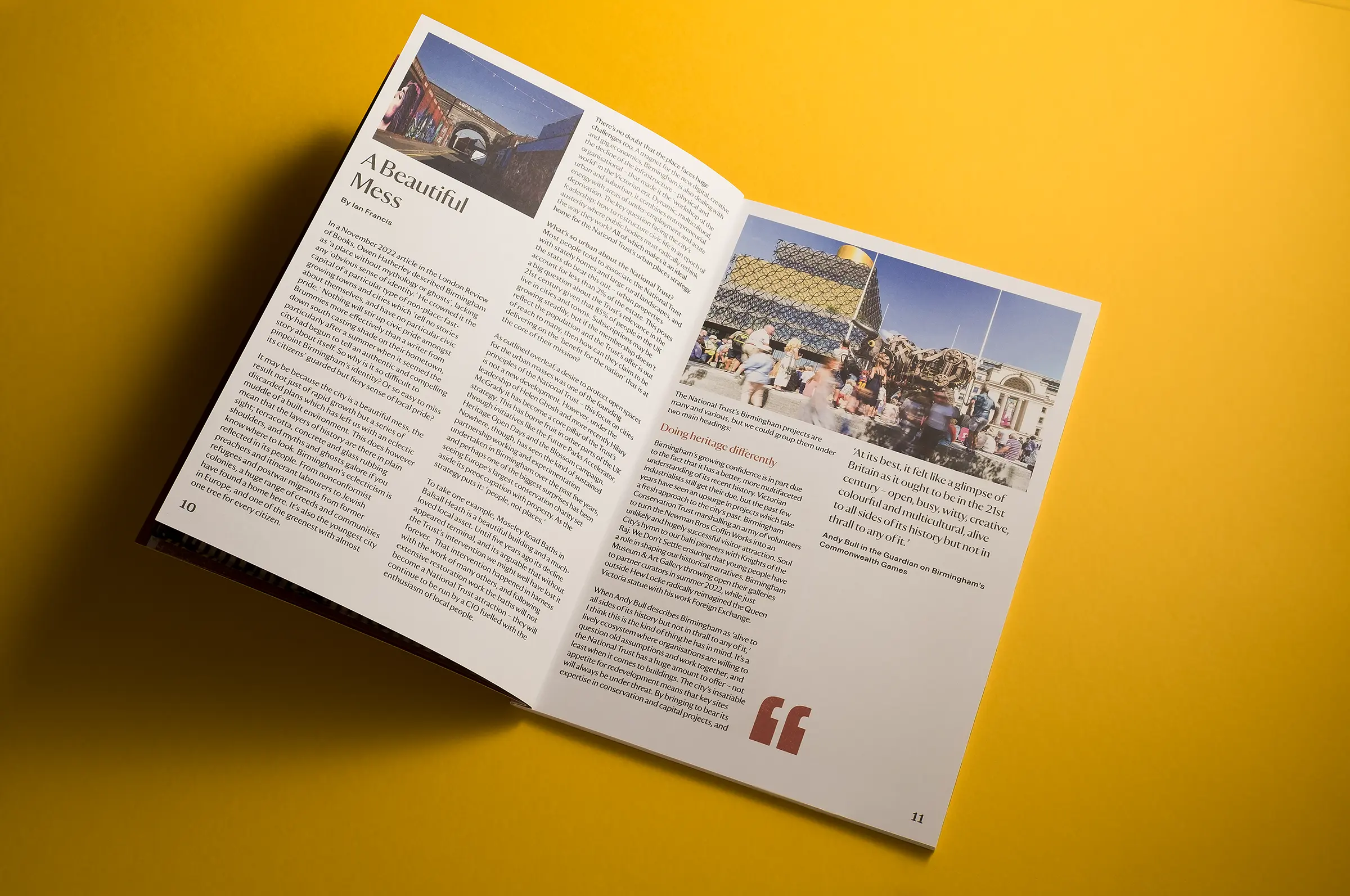 An image of a white brochure for National Trust Birmingham, lying on a bright yellow background