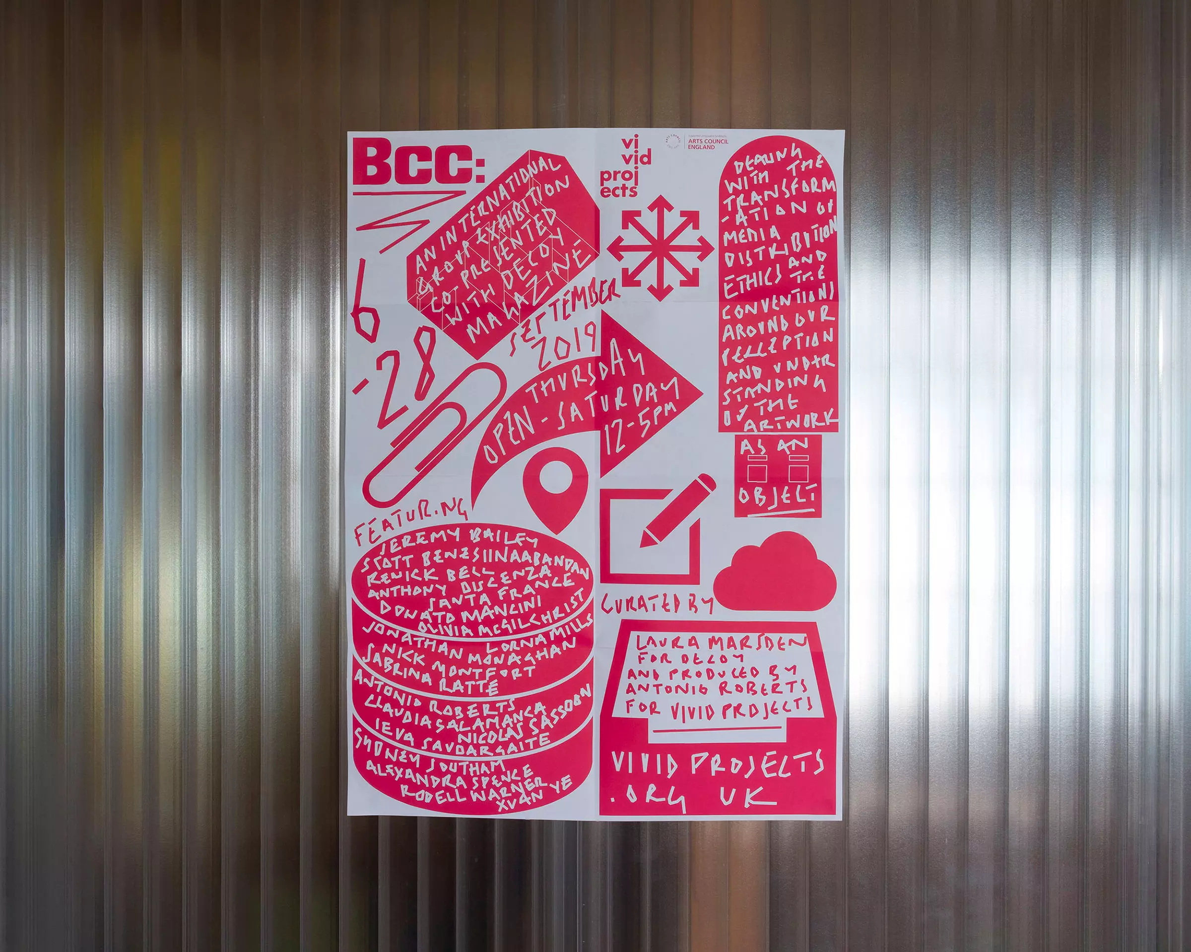 A red and white poster for BCC, featuring an assortment of symbols relating to computing, overlaid with hand-written text.